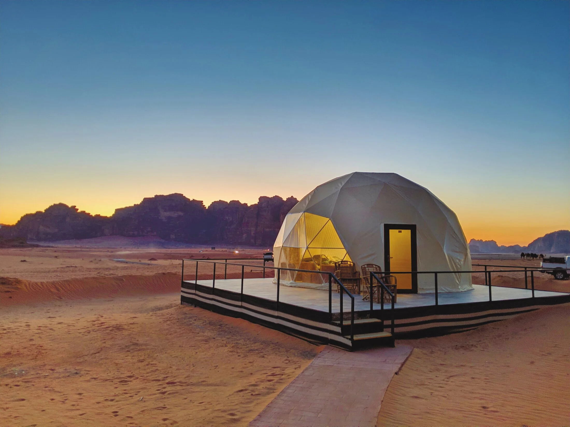 YeSol geodesic glamping dome at sunset