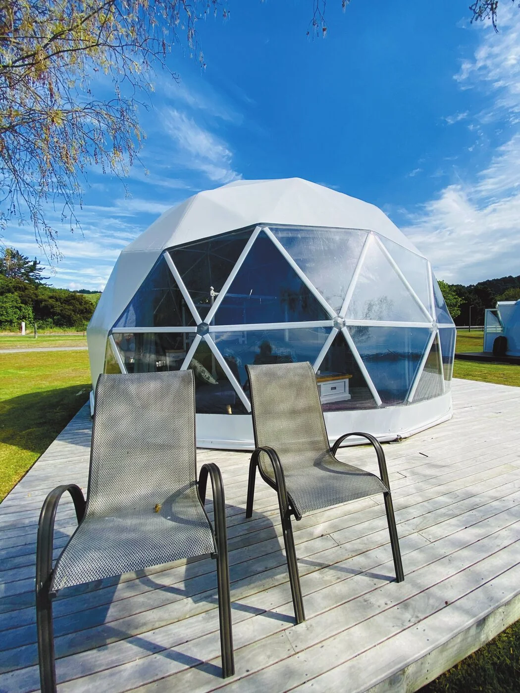 Glass geodesic dome interior with panoramic view